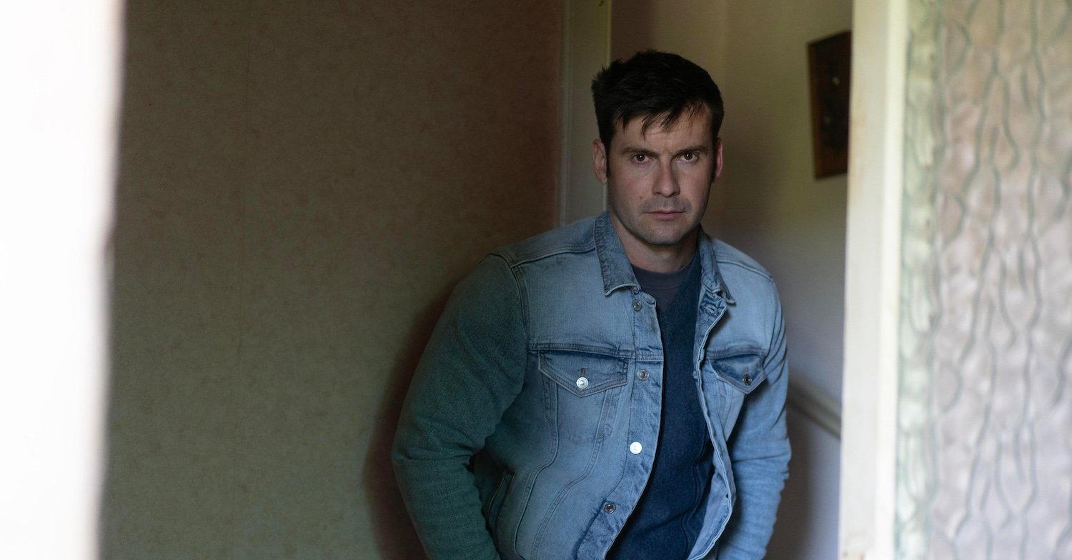 Mark Rowley plays bounc er Mick Prentice, here seen wearing some 1980s double denim, in Karen Pirie series two