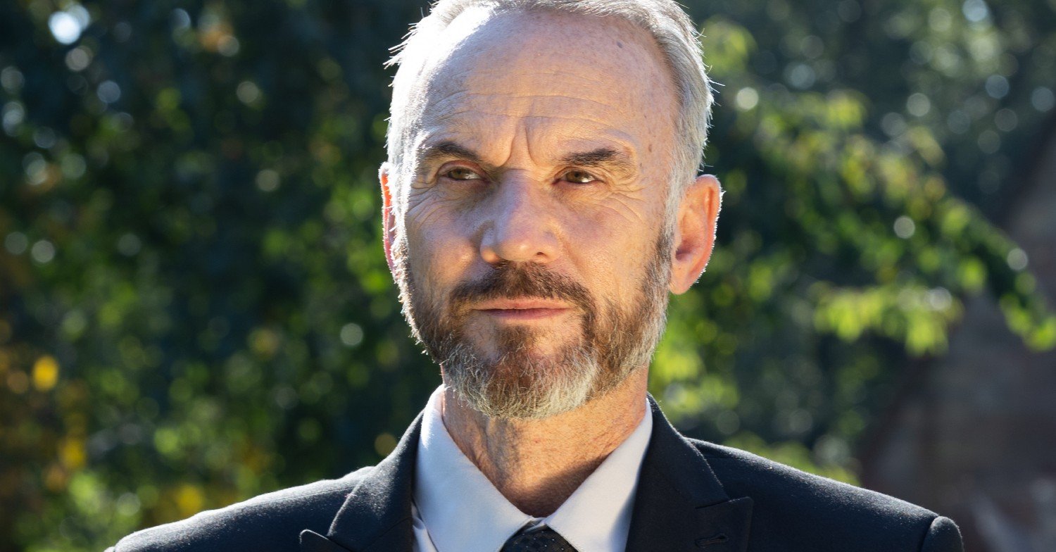 Mark Womack as Paul Patterson in Unforgivable