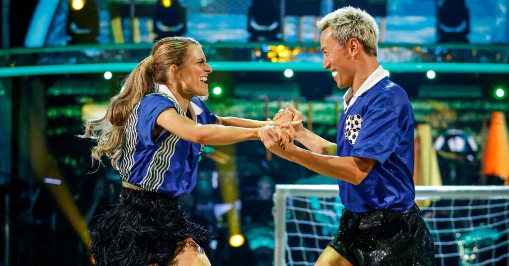 Carlos Gu and Karen Carney dancing a jive on Strictly
