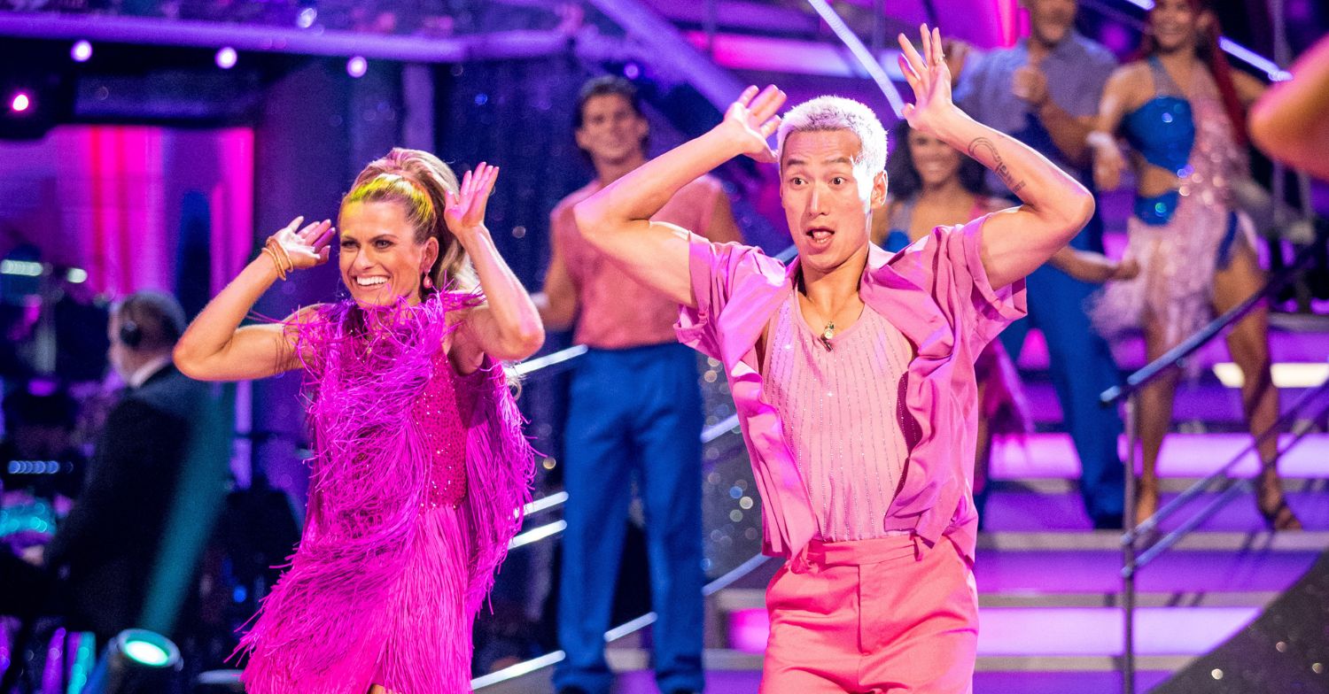 Karen Carney and her pro partner Carlos Gu dancing on stage