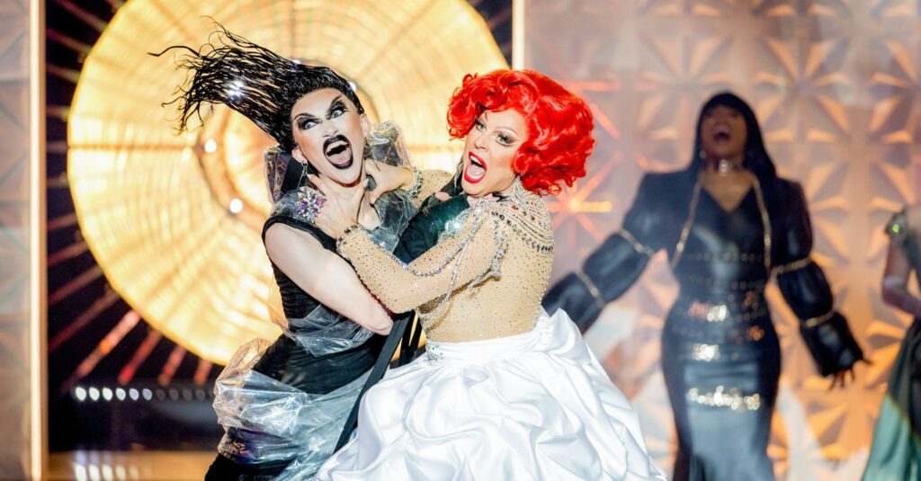 La Voix lip syncing during a competition on RuPaul's Drag Race UK