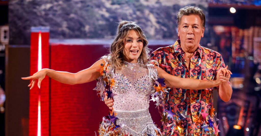 Ross King and Jowita Przystał performing a cha-cha-cha
