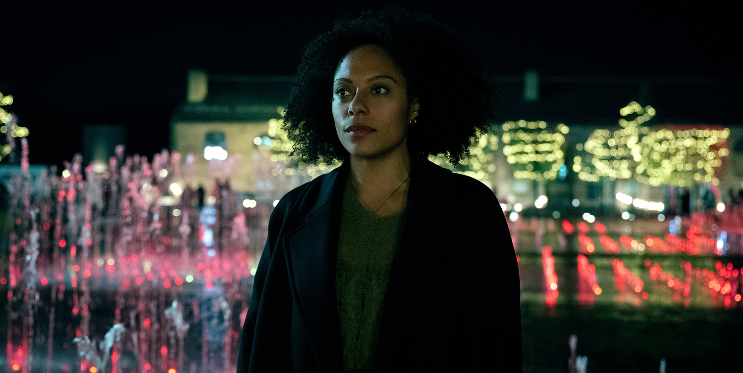 Rosalind Eleazar as Louise Guy in Slow Horses season 5 with water fountains in the background.
