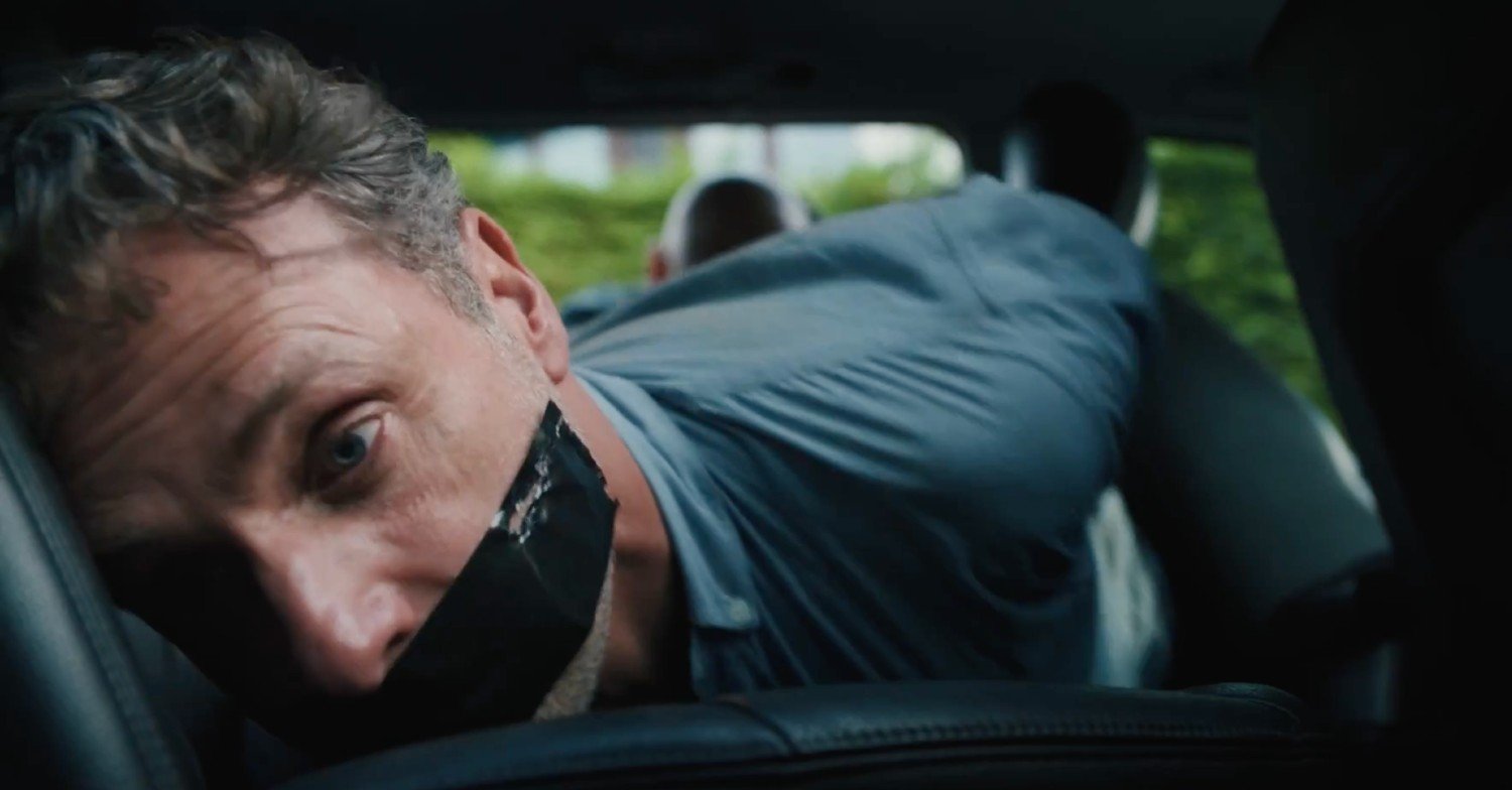 John gagged in the back of Tommy's car in Coldwater