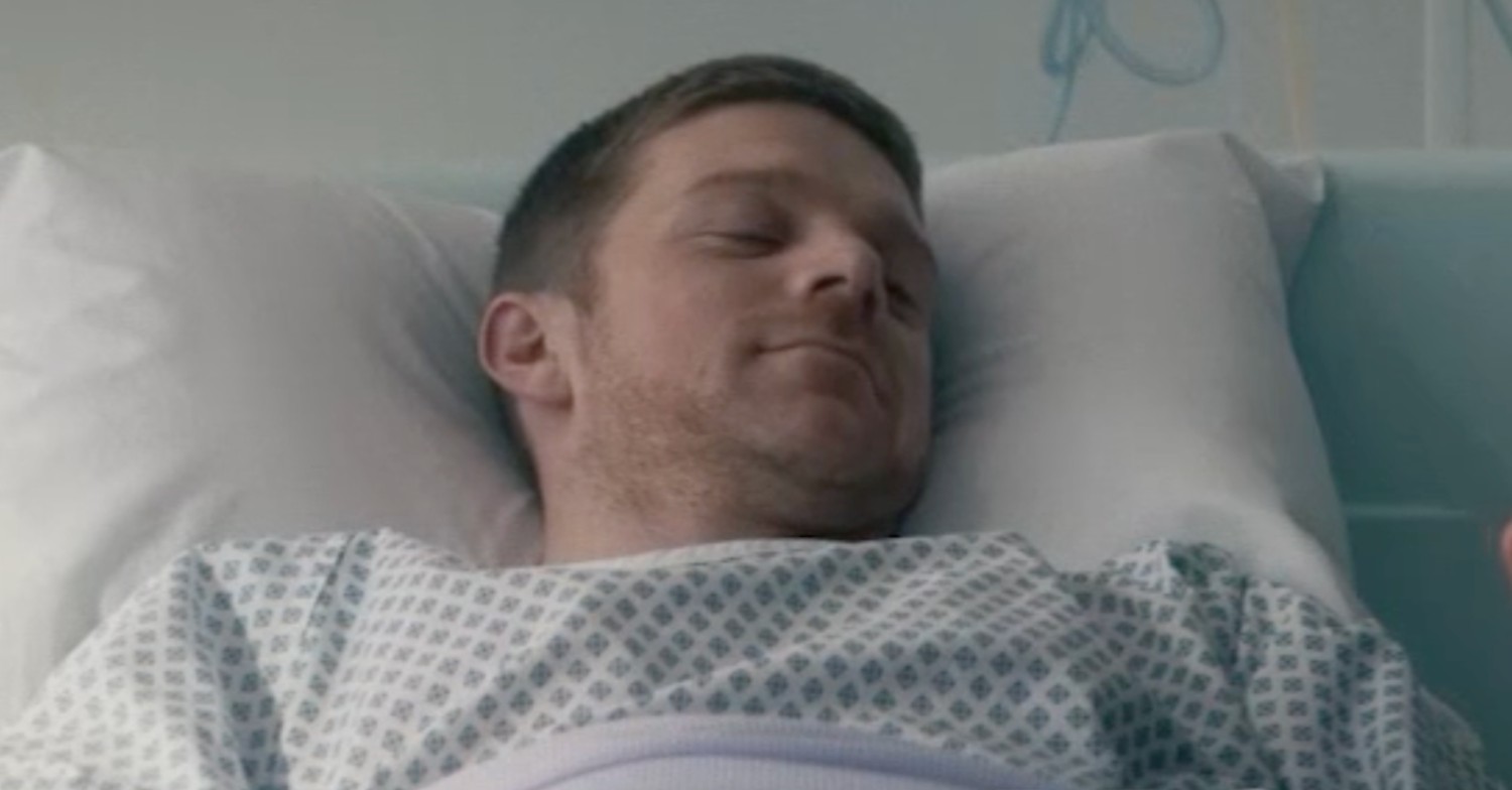 Shane in hospital bed in Blue Lights 