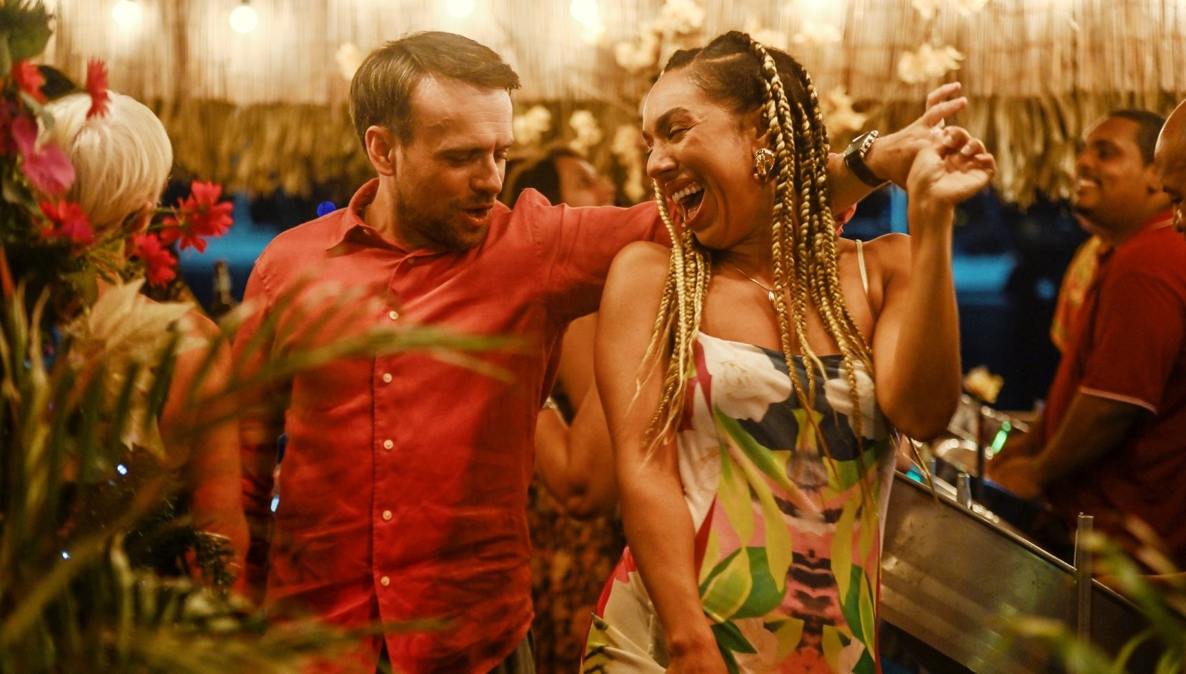 Two characters dancing for the Death in Paradise Christmas special