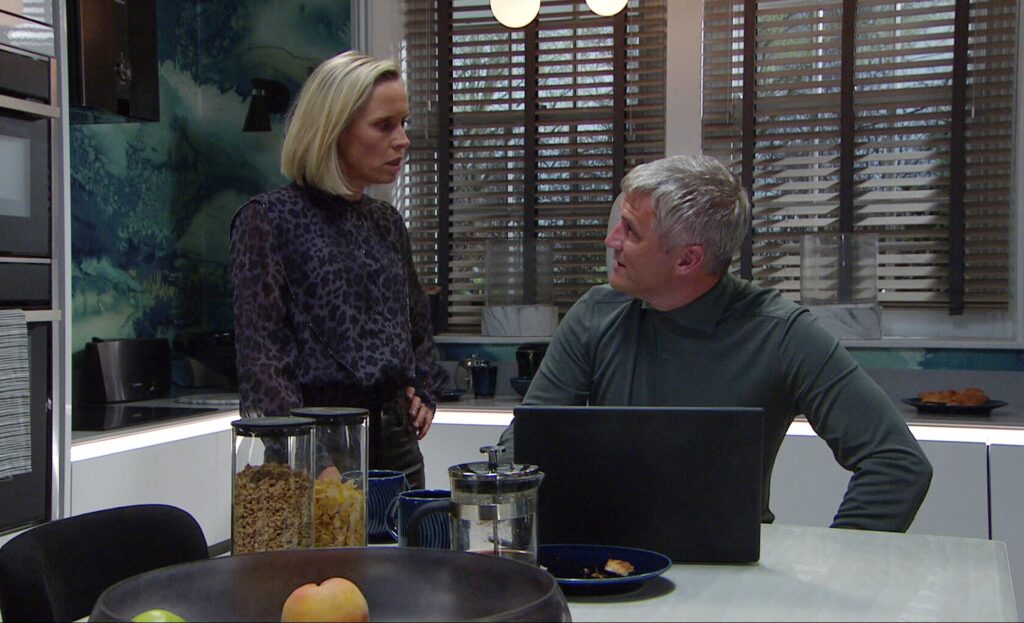 Caleb and Ruby talk in their kitchen
