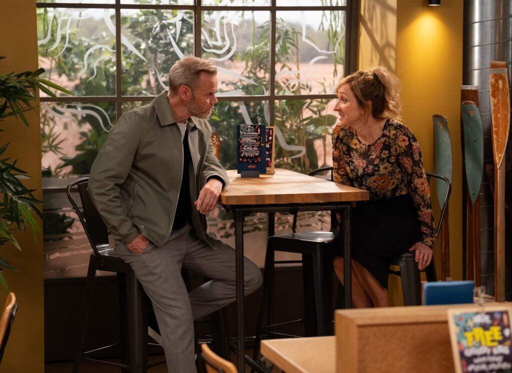 Ray and Laurel have a drink together