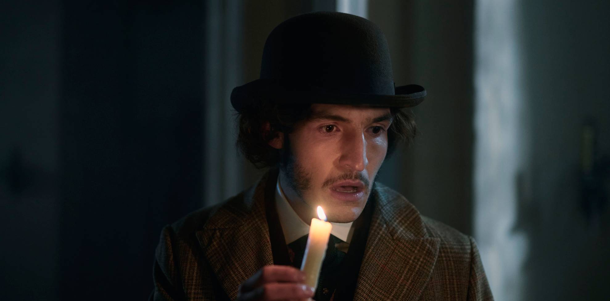 Jack (Éanna Hardwicke) holds a candle in Woman of Stone