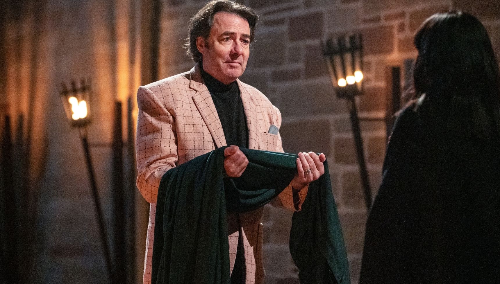 Jonathan Ross with his Traitors cloak