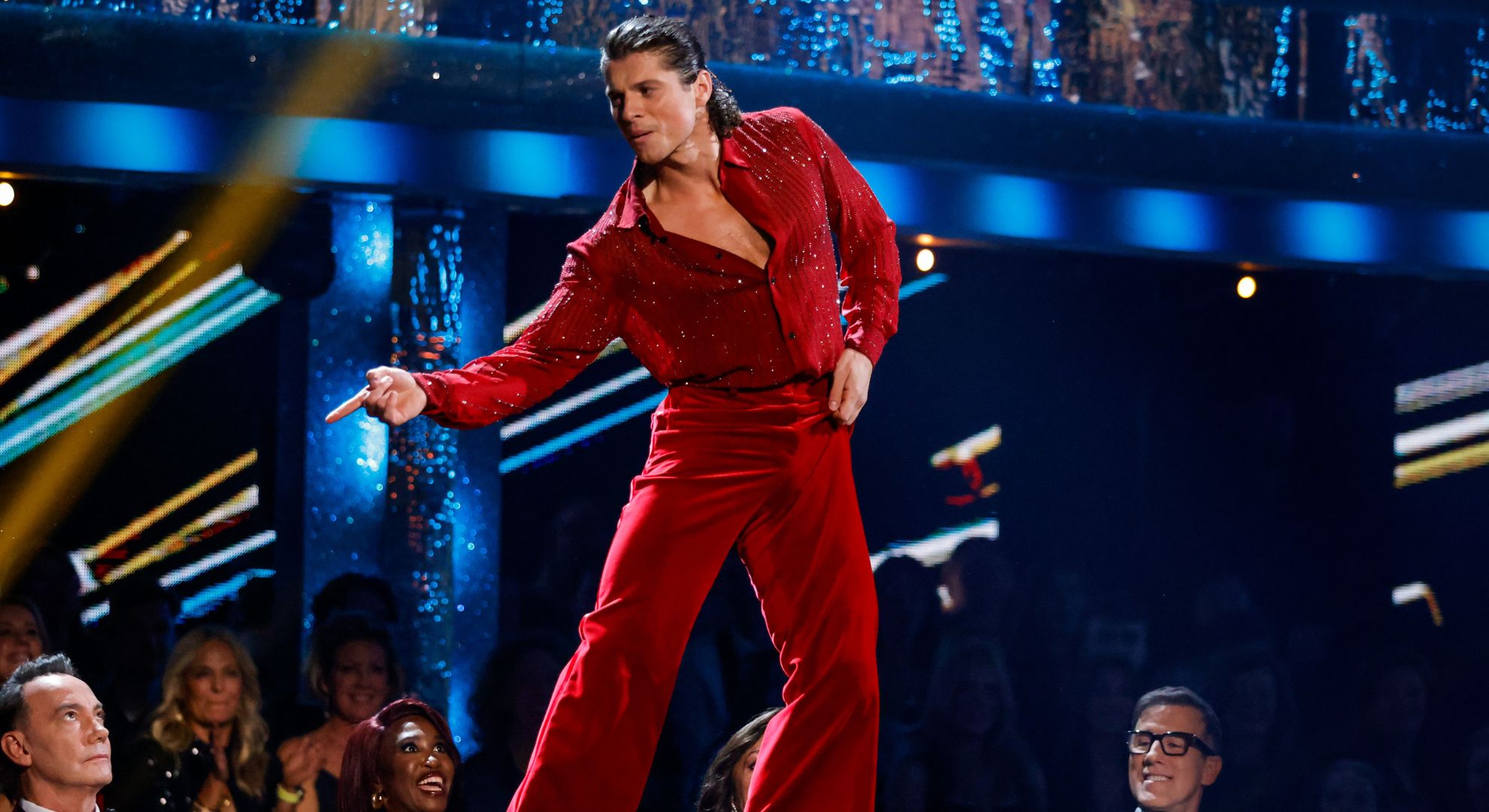 Lewis Cope in red suit