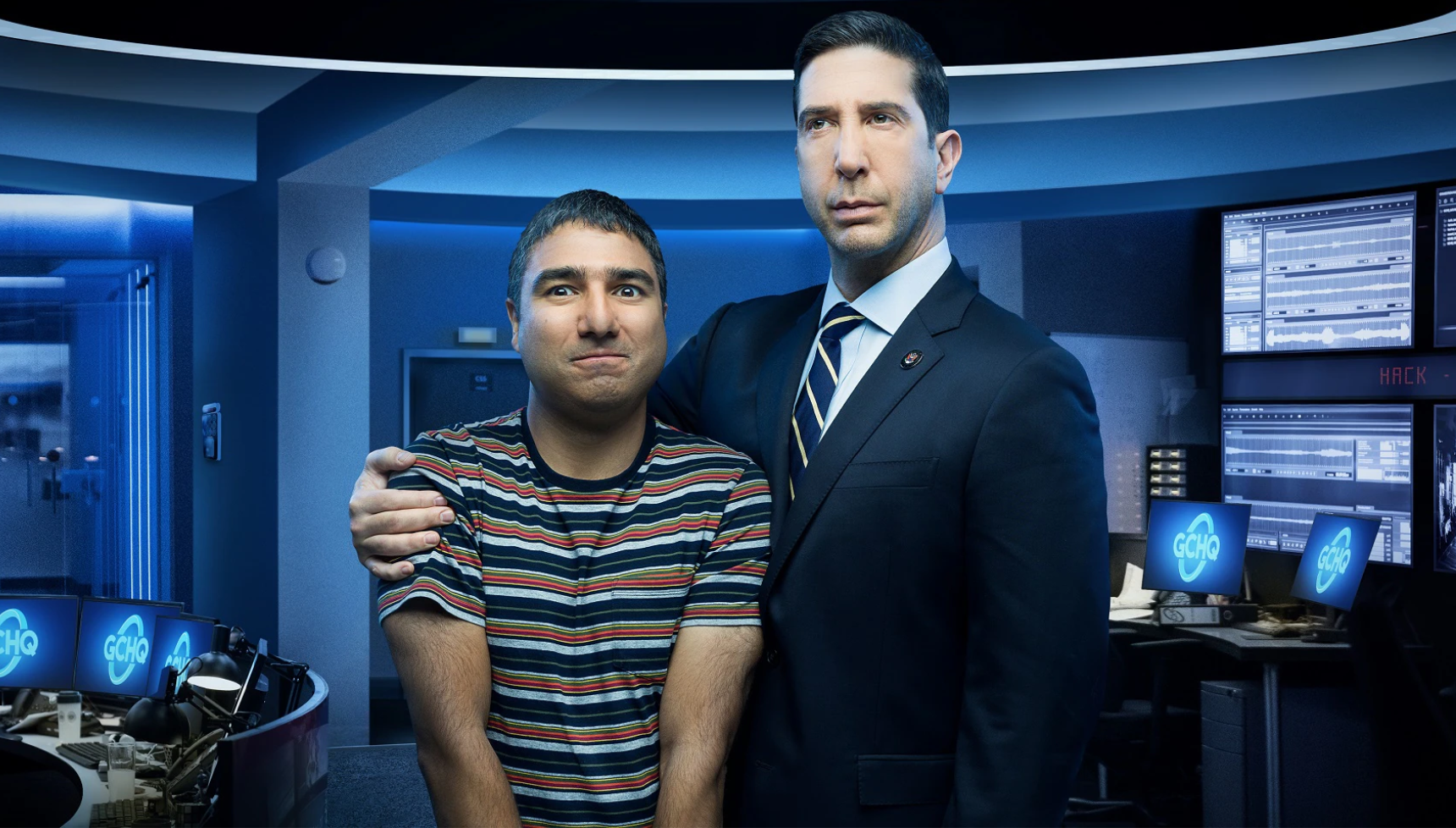 A close up of Nick Mohammed and David Schwimmer in Intelligence