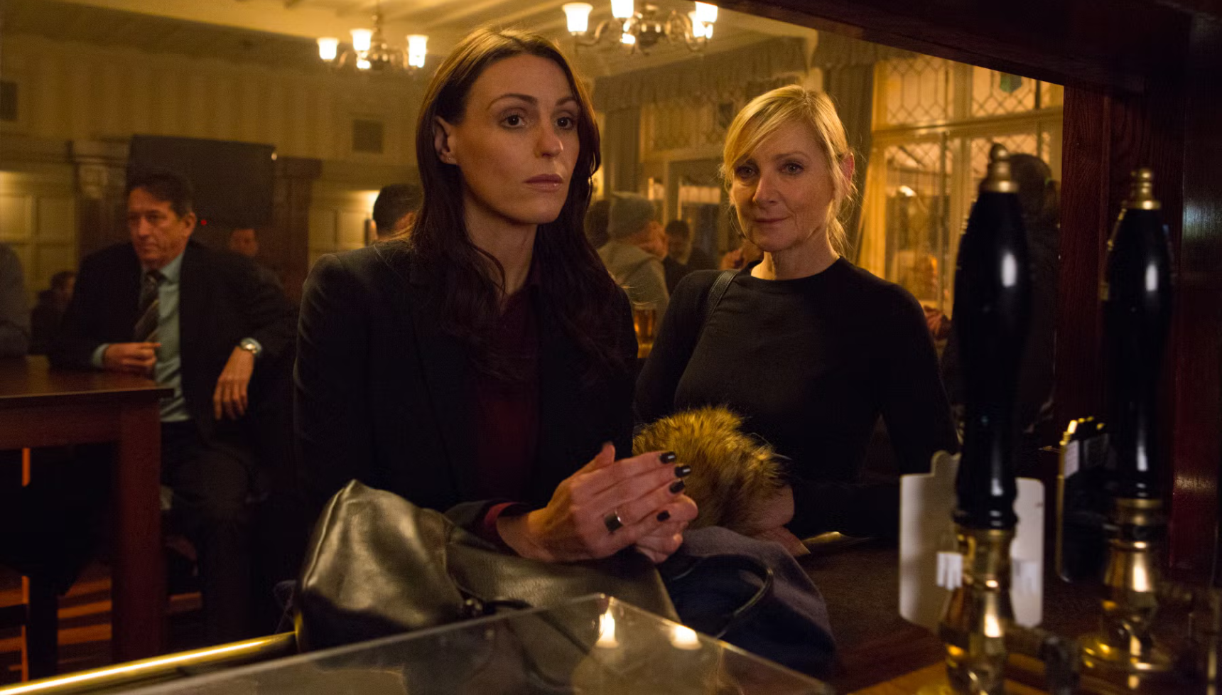 Suranne Jones and Lesley Sharp at a pub in Scott & Bailey.