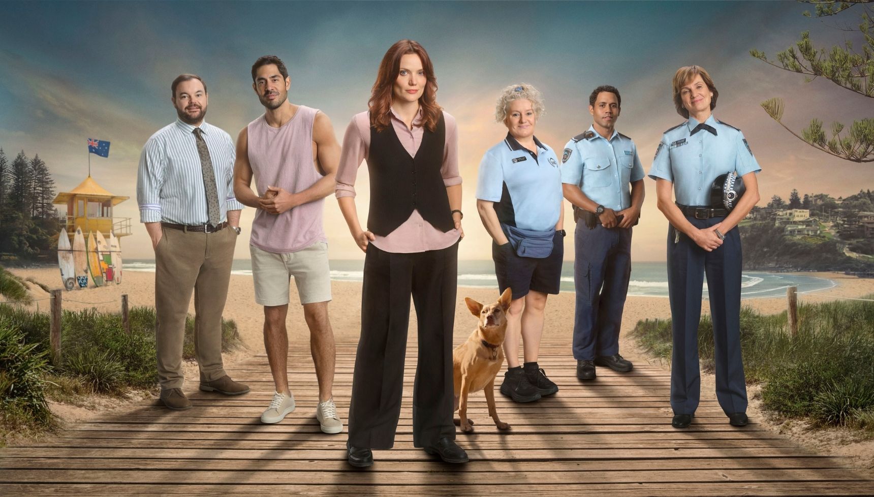 The Return to Paradise cast standing in a row