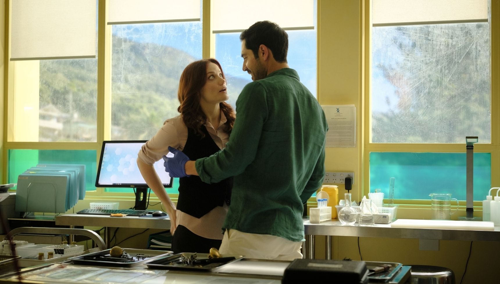 Glenn and Mackenzie looking close in his lab