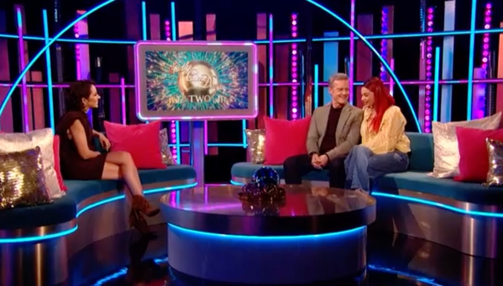 Stefan Dennis sits with Dianne Buswell on It Takes Two
