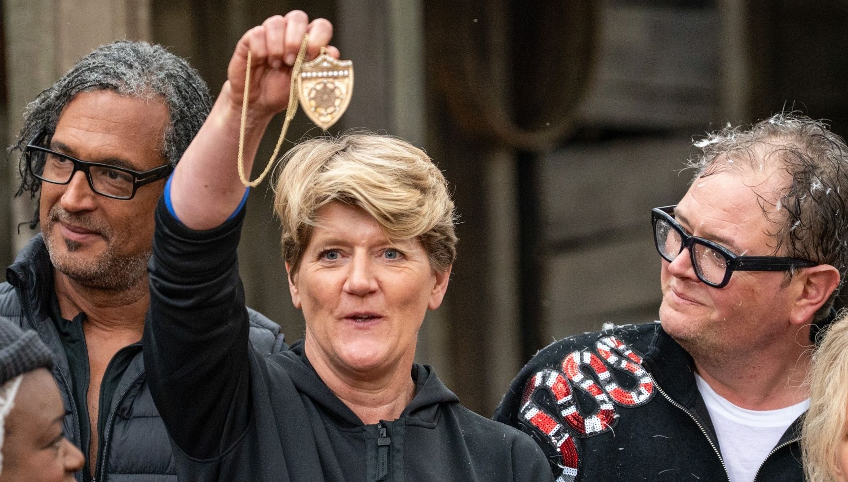 Clare Balding holding up her immunity shield