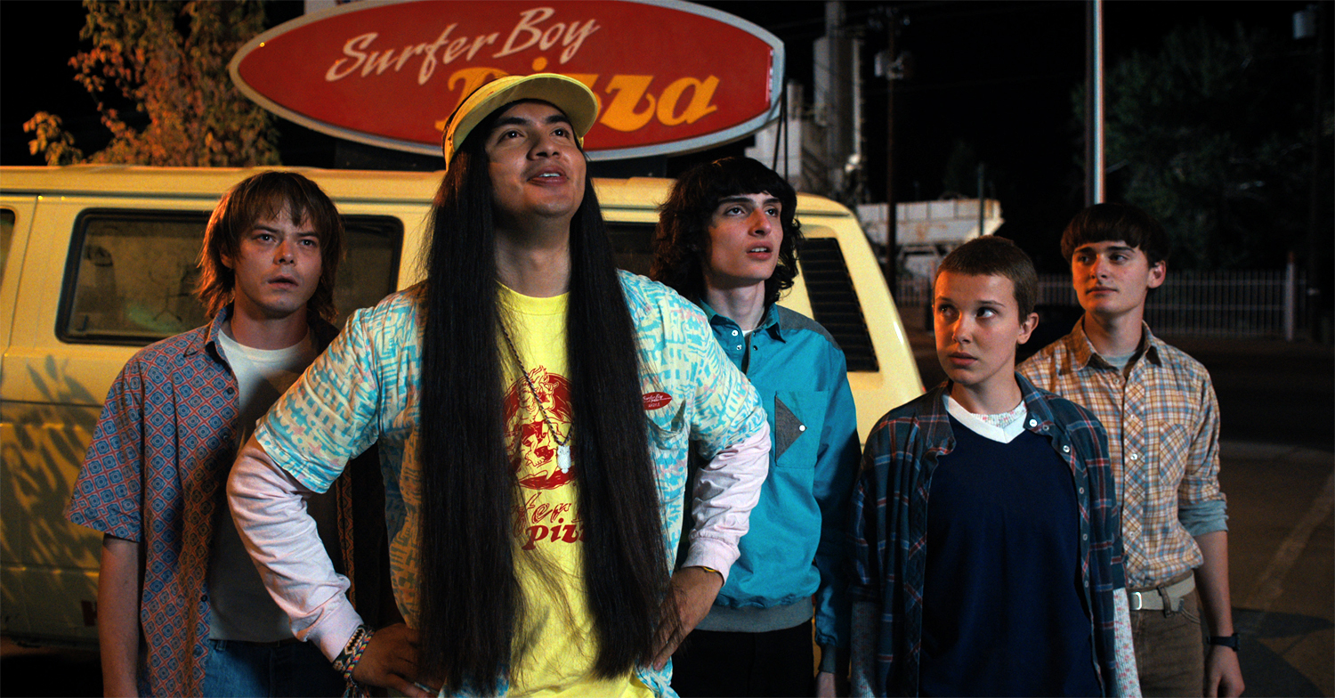 Charlie Heaton as Jonathan, Eduardo Franco as Argyle, Finn Wolfhard as Mike, Millie Bobby Brown as Eleven and Noah Schnapp as Will in Stranger Things