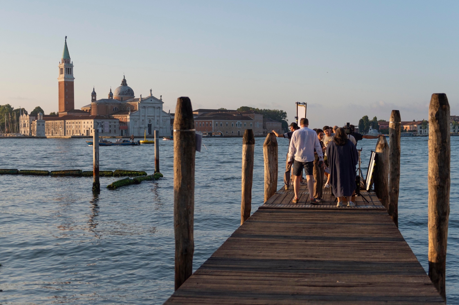 The Forsytes cast and crew filming by the water in Venice, Italy.
