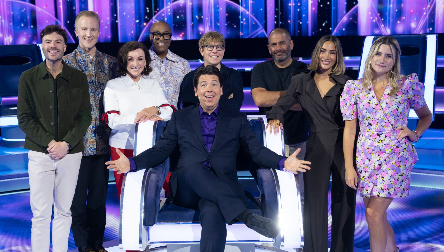 The Wheel series 6 episode 2 celebrity cast pose on the set of BBC gameshow