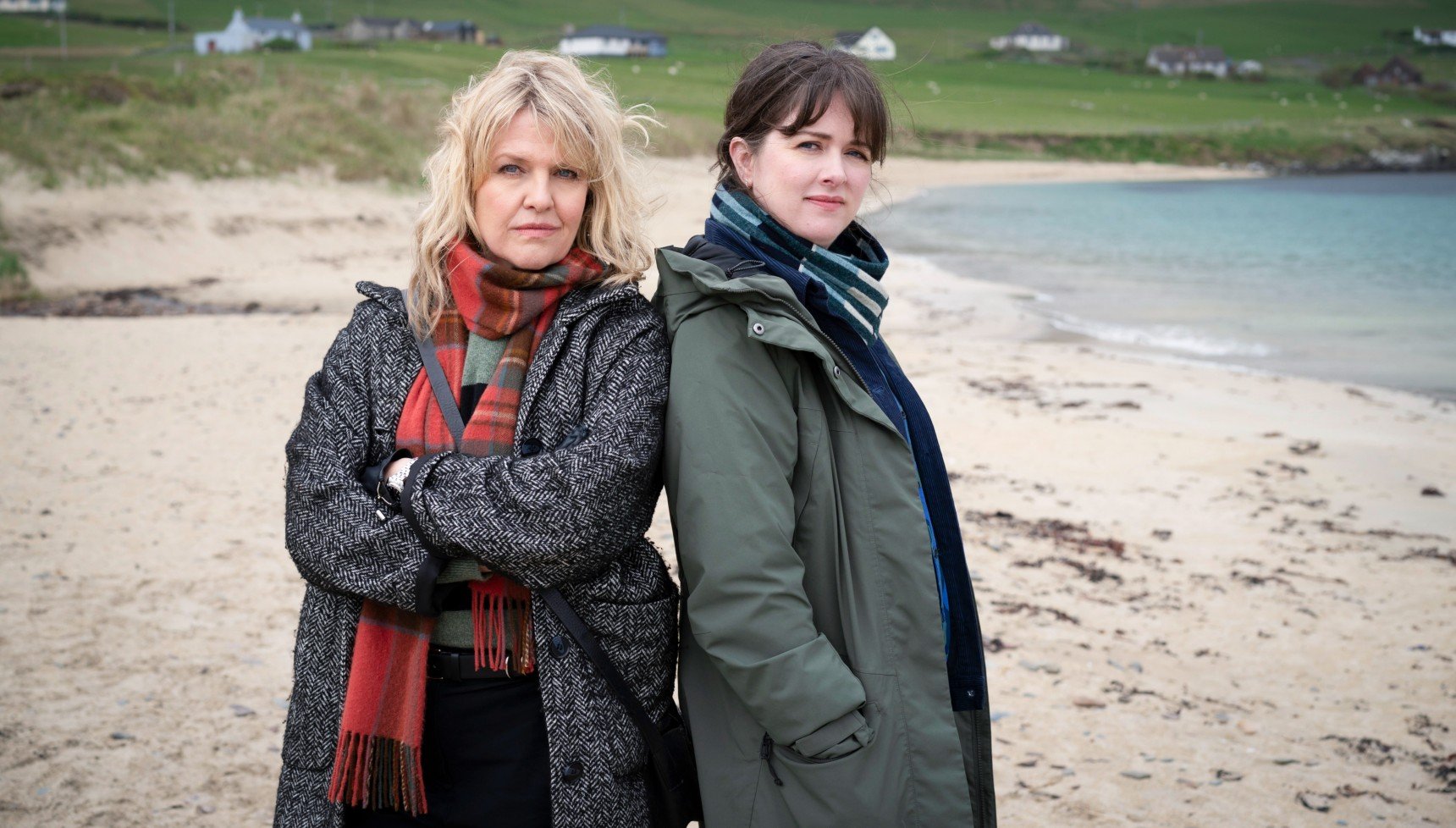 Calder and Tosh on beach in promo shot for Shetland S10