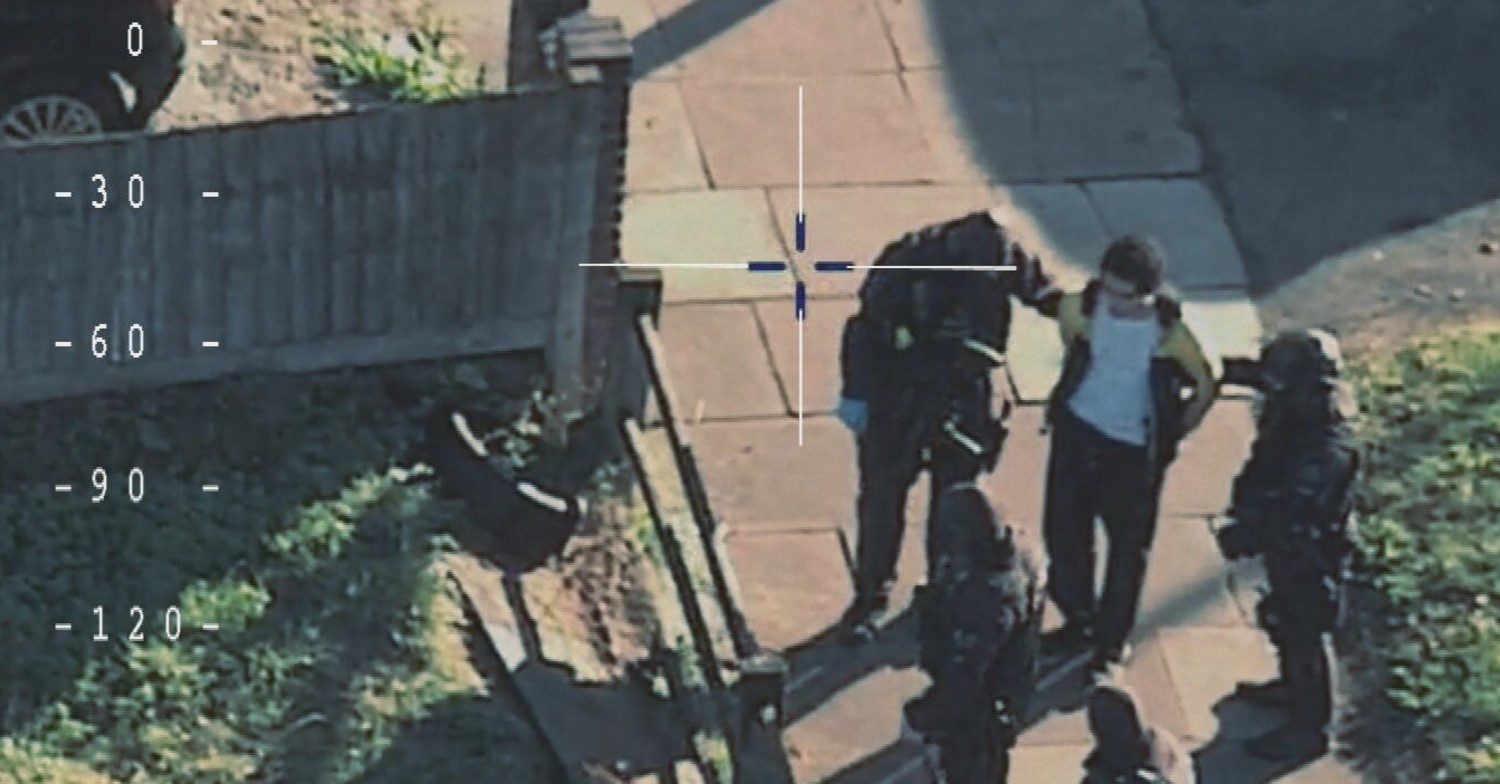Police arresting Nicholas Prosper