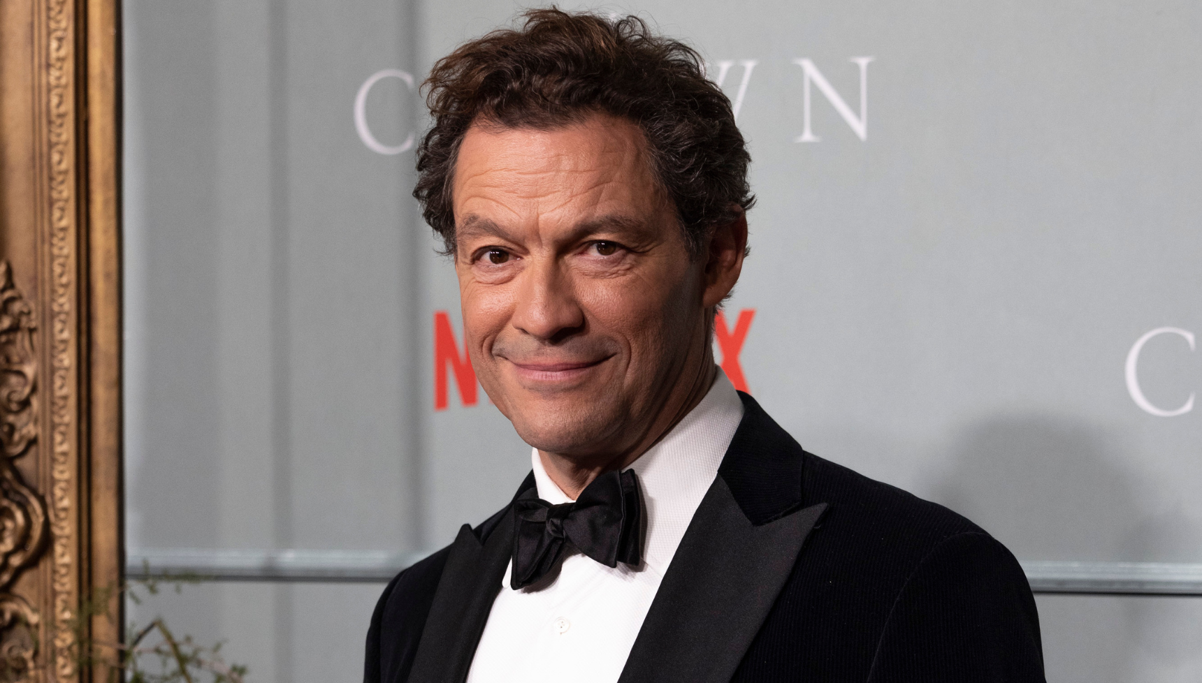 A close up of Dominic West on the red carpet for The Crown.