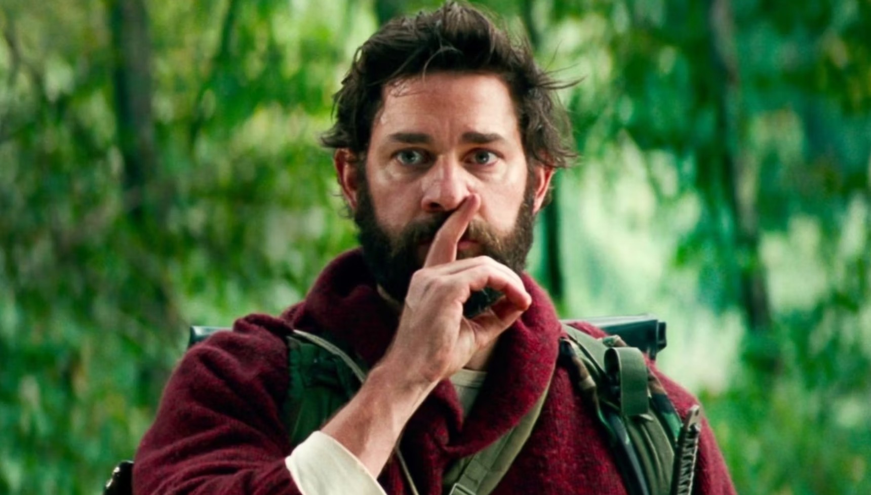 John Krainski holding his finger to his mouth in A Quiet Place