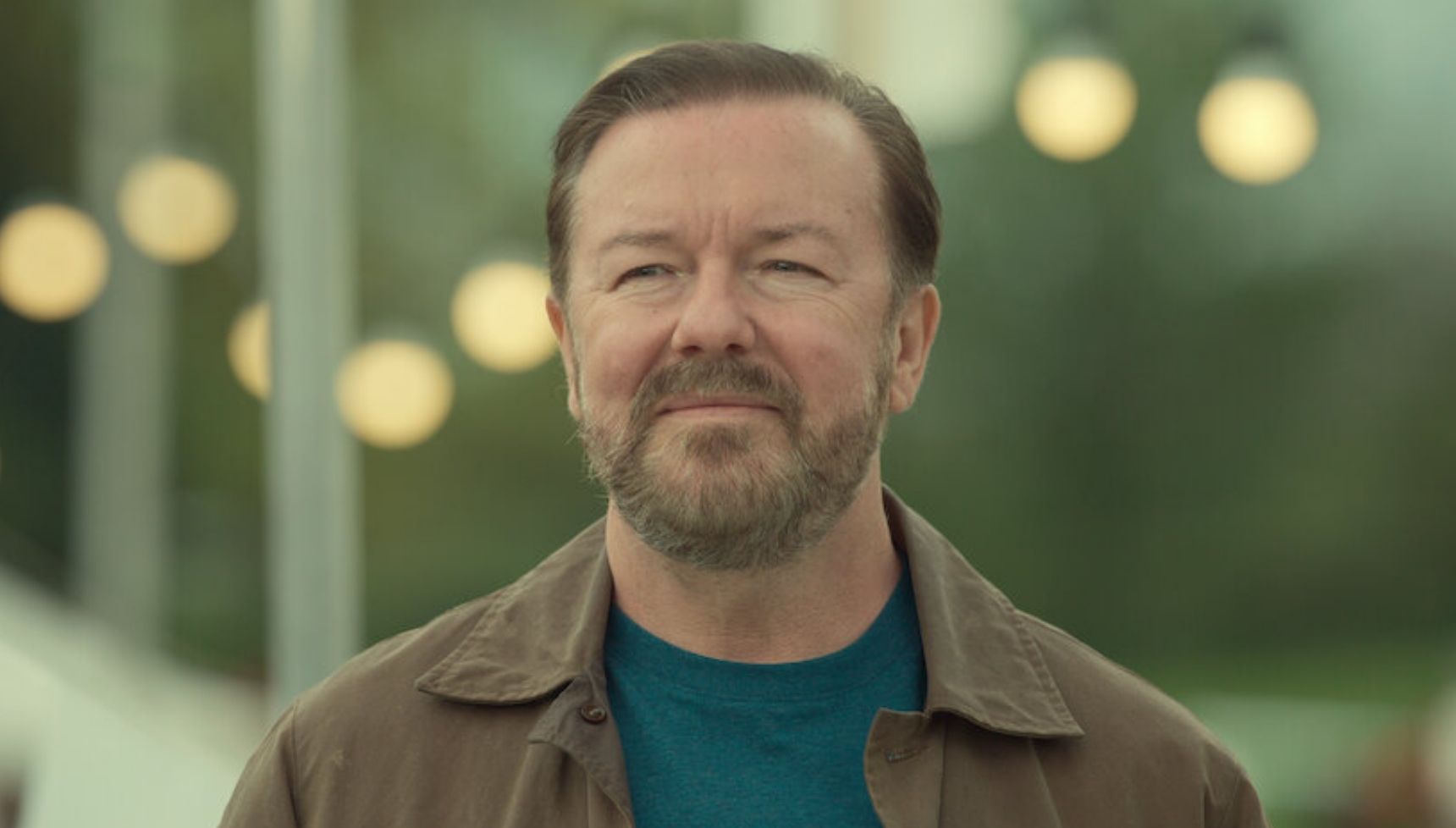 Ricky Gervais smiling in After Life