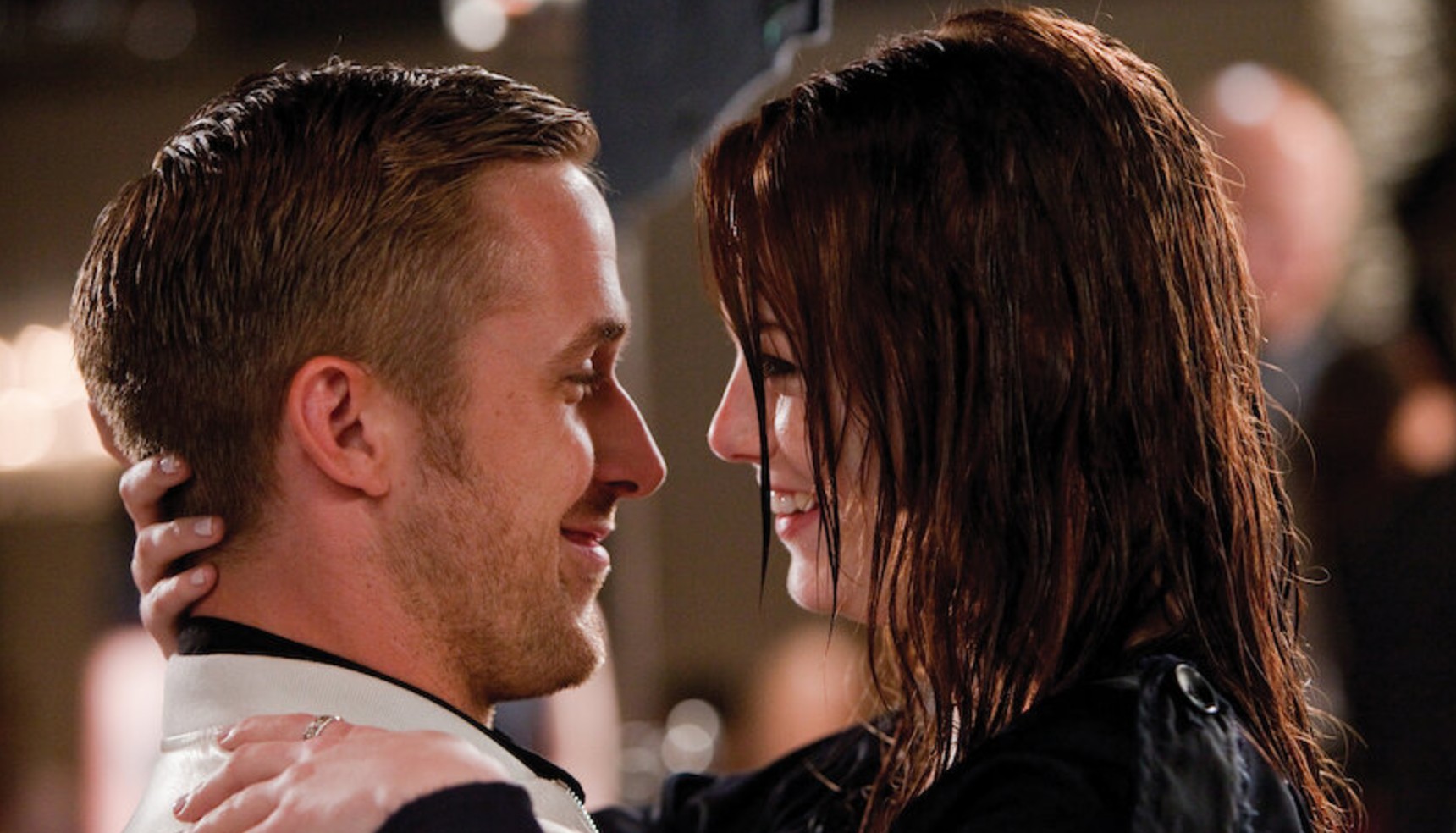 Ryan Gosling and Emma Stone looking at each other in Crazy Stupid Love