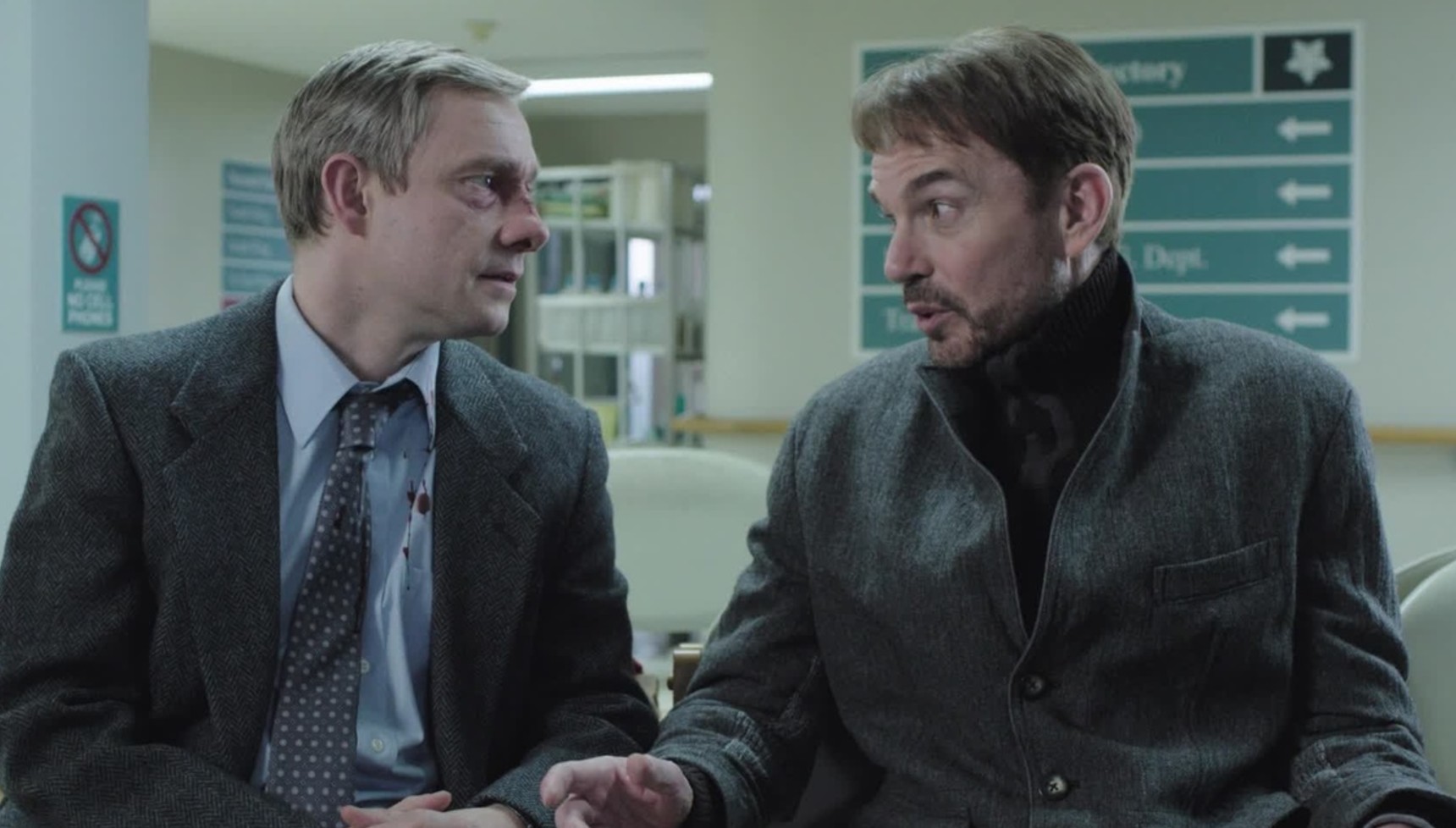 Martin Freeman sitting next to Billy Bob Thornton in the first season of Fargo 