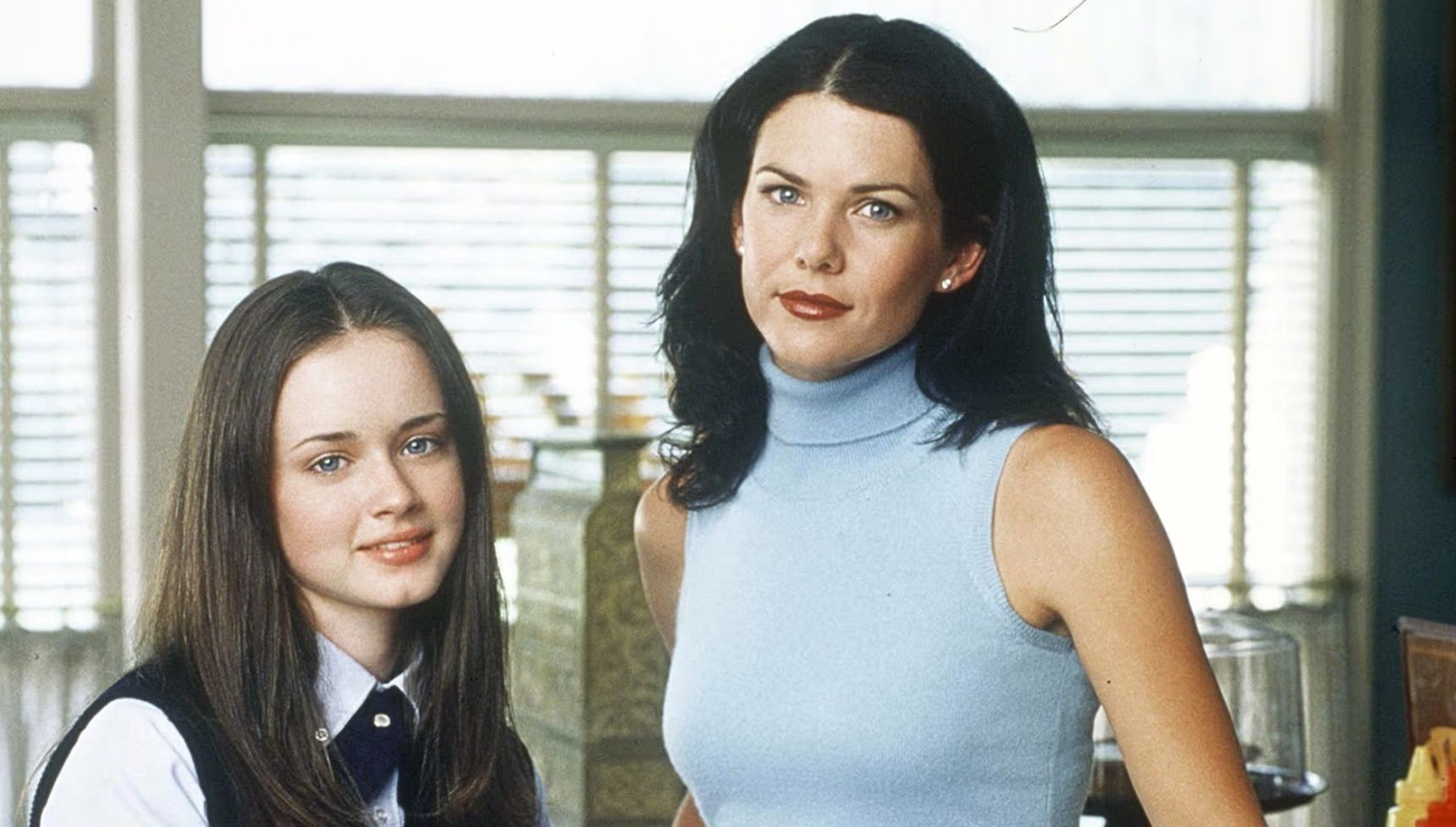 Rory and Lorelai standing together in Gilmore Girls