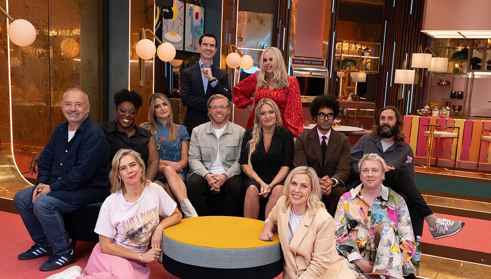 The cast of Last One Laughing UK Season 1 sitting together