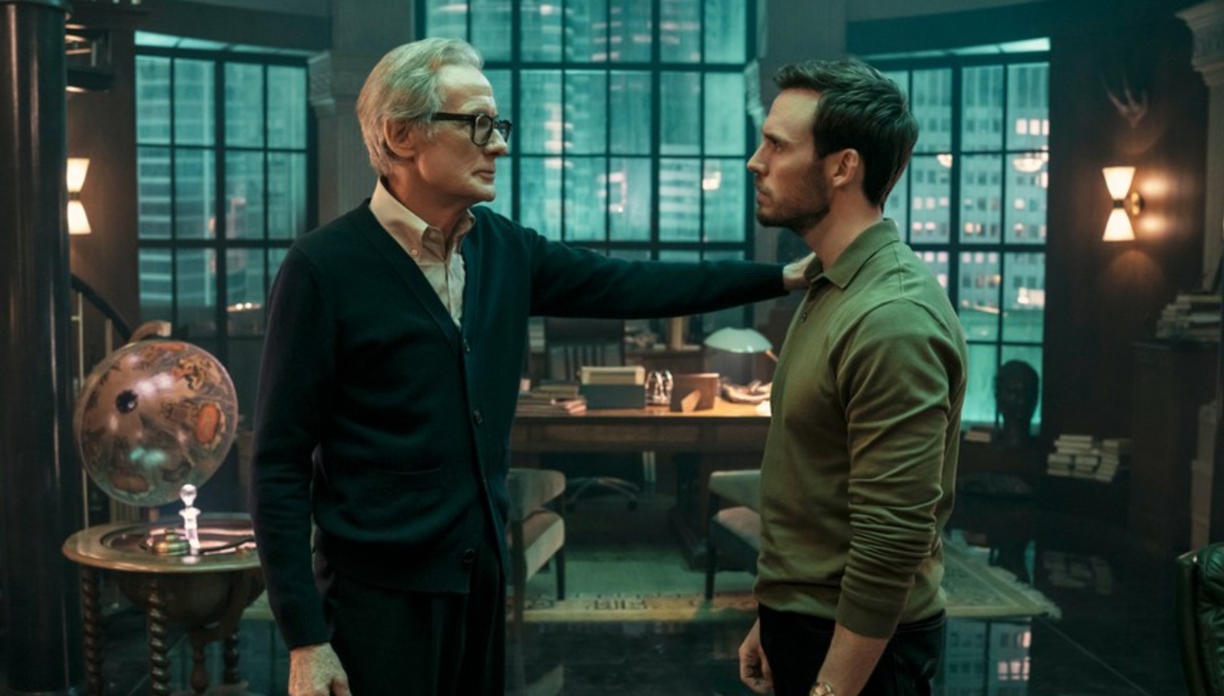 Bill Nighy with his hand on Sam Claflin's shoulder in Lazarus