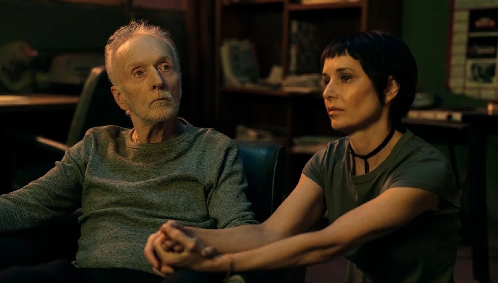 John Kramer and Amanda holding hands in Saw X