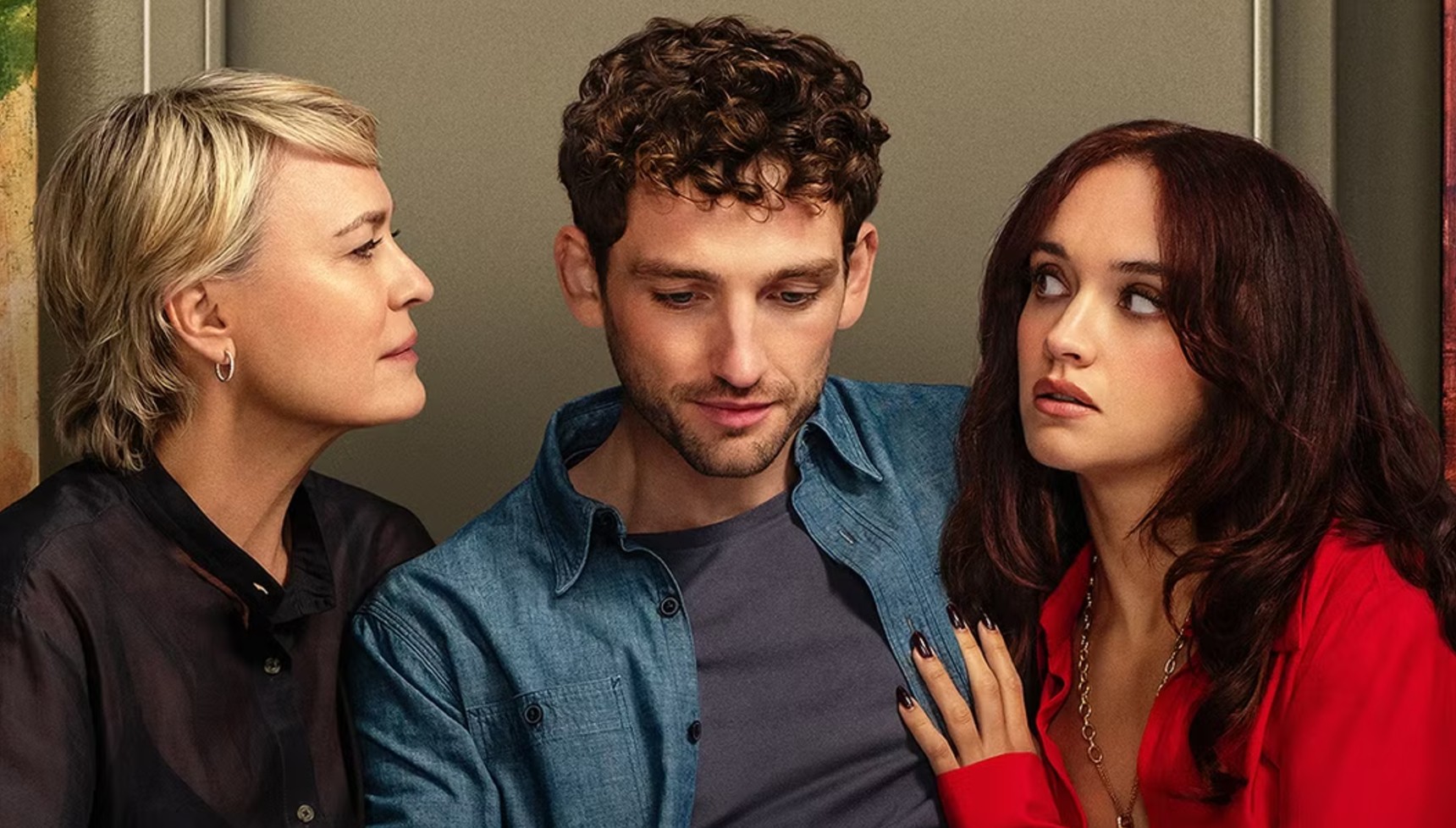 Robin Wright looking at Olivia Cooke as she looks at Laurie Davidson in The Girlfriend