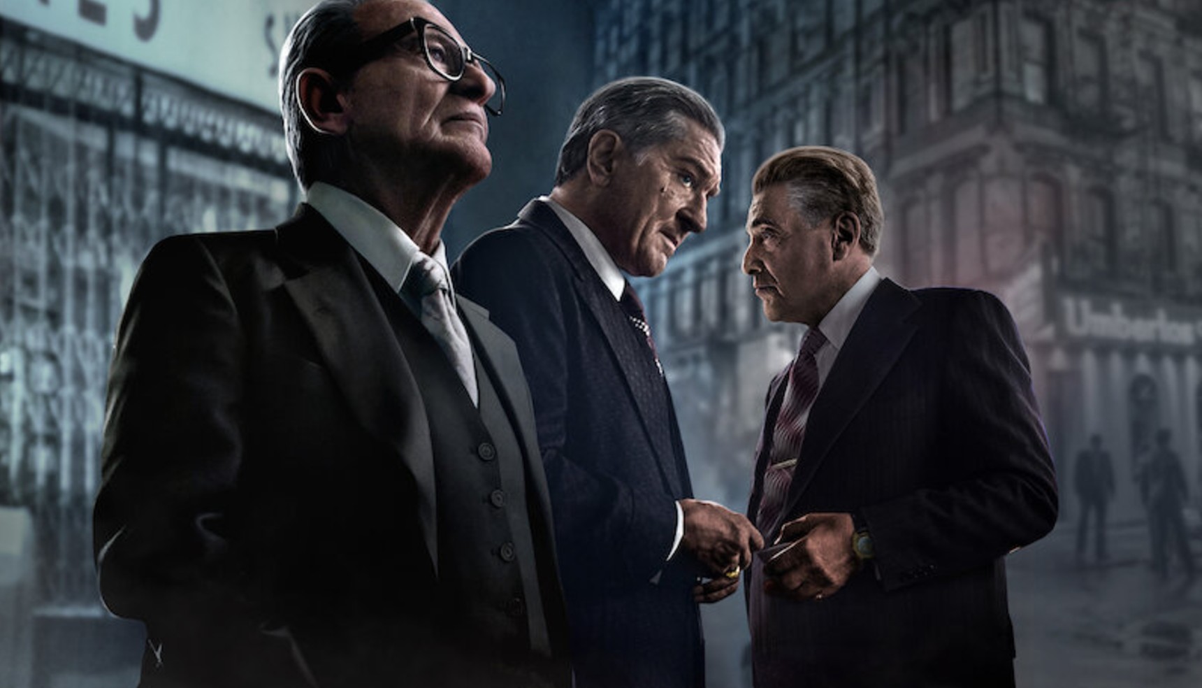 Joe Pesci, Robert De Niro, Al Pacino in suits in a poster for The Irishman