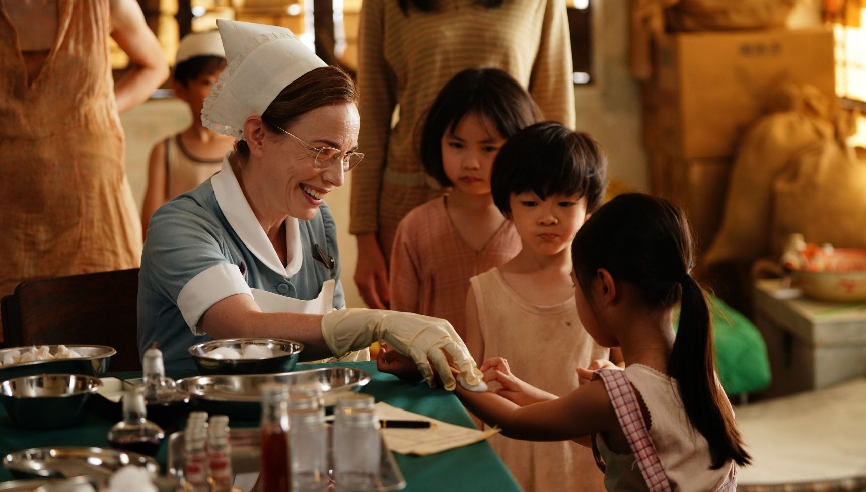 Shelagh helping a patient in Hong Kong