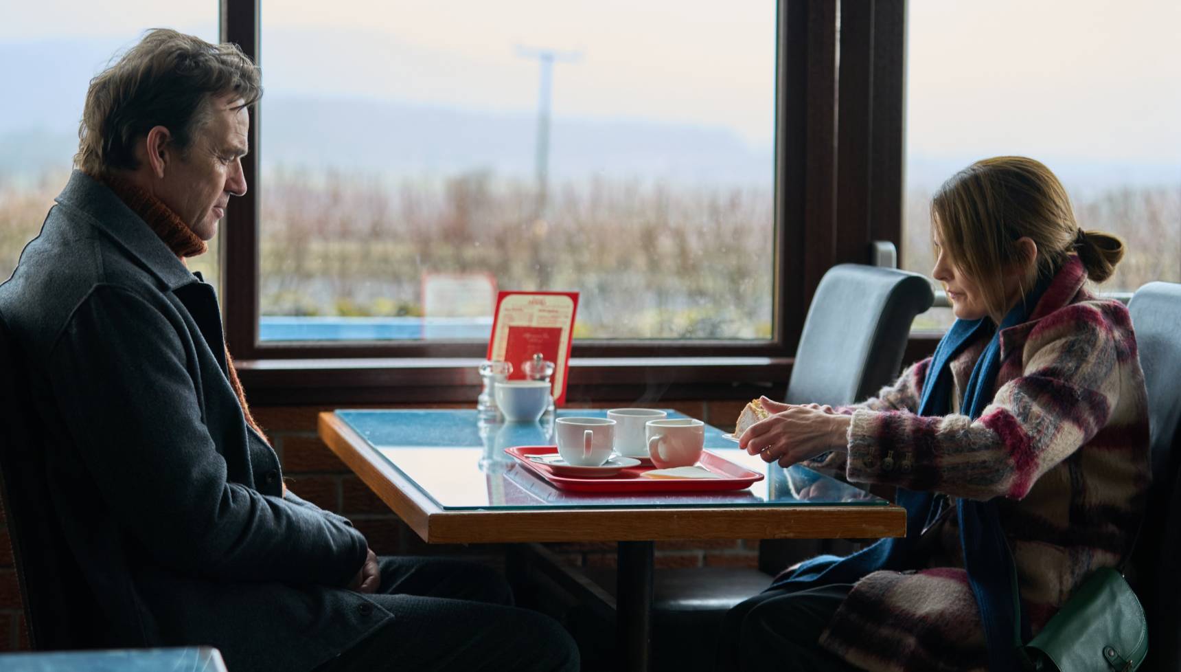 David and Annie share a drink at a cafe in Summerwater