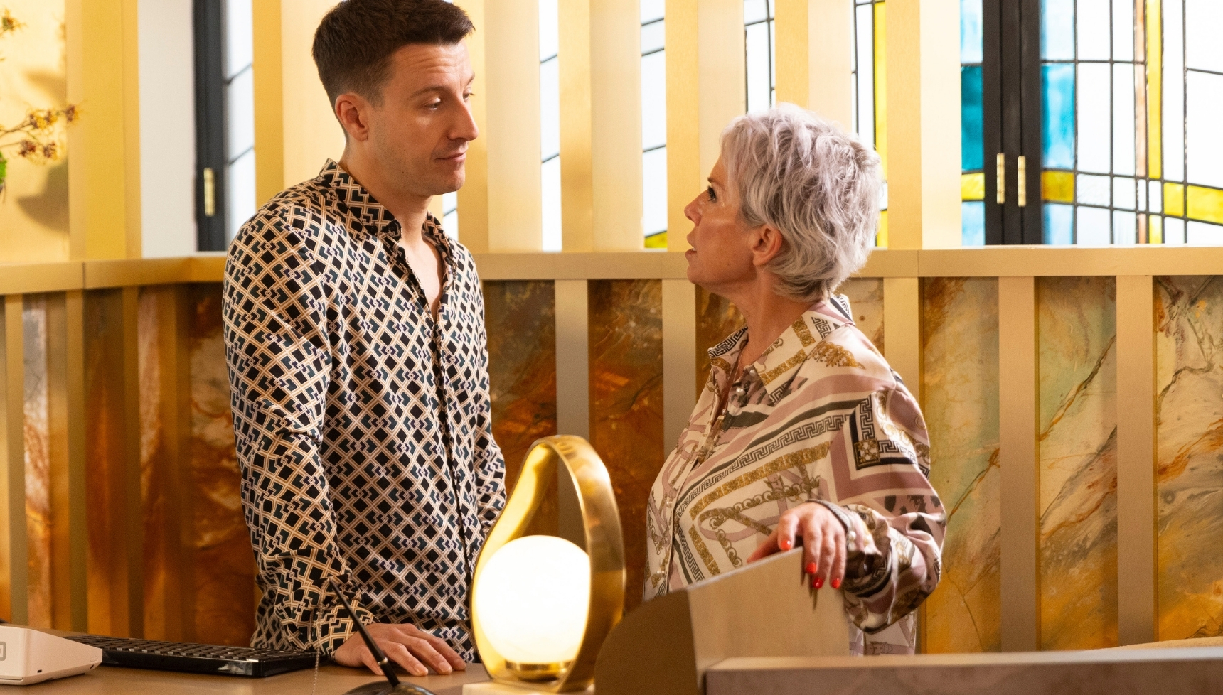 Coronation Street's Ryan talking to Debbie at the hotel