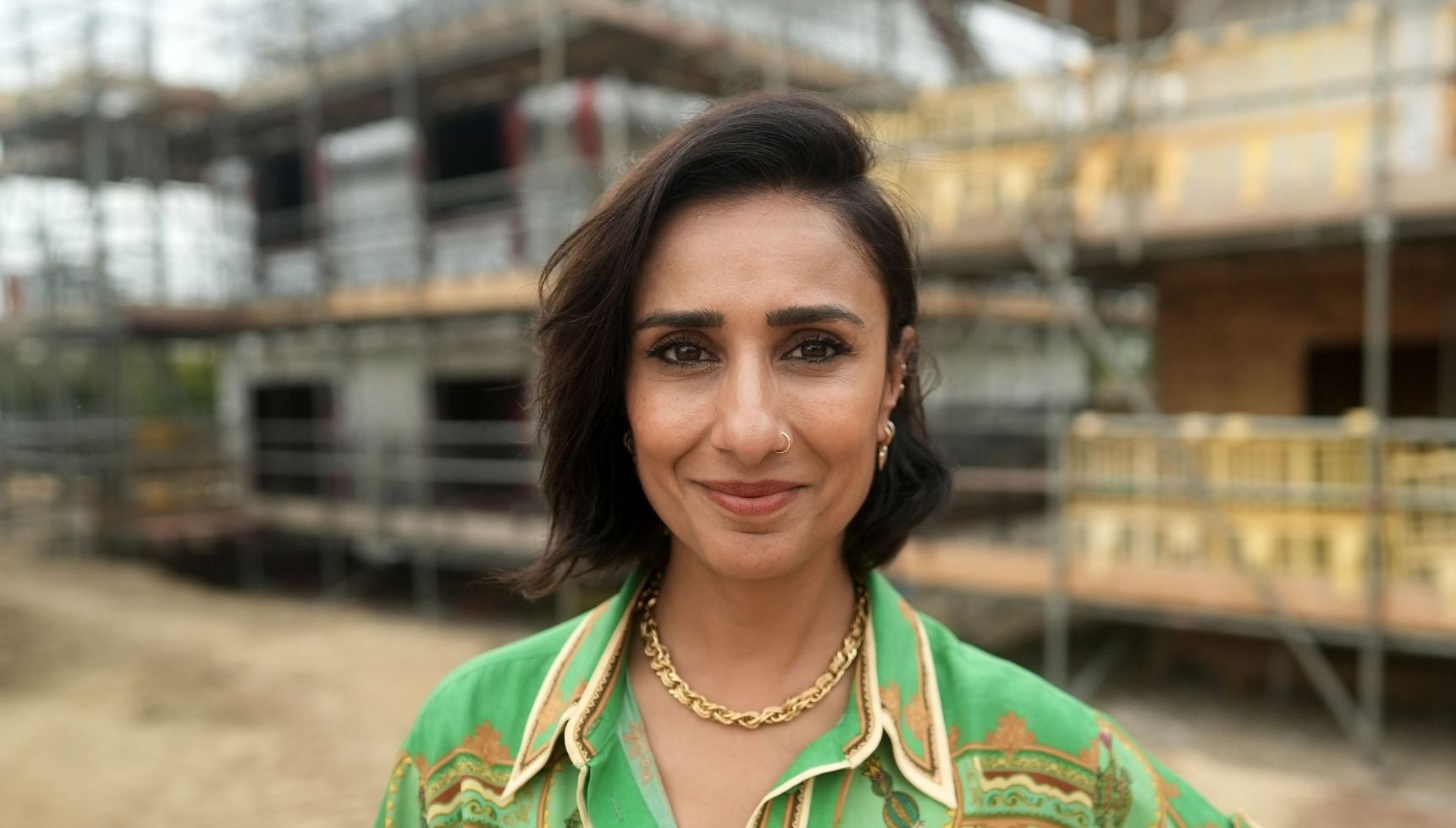 Anita Rani smiles