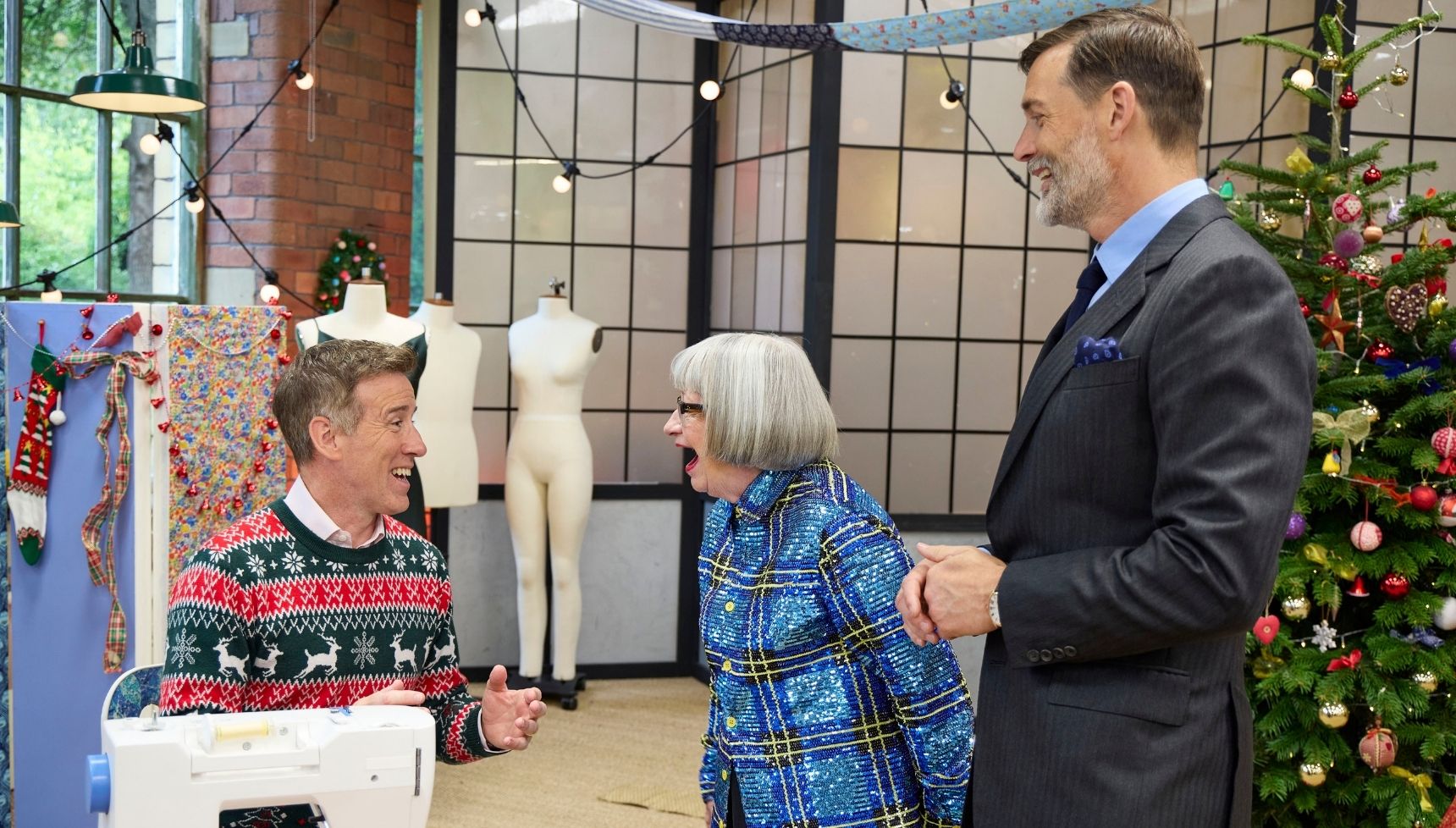 Anton chats to the judges on The Great Christmas Sewing Bee 