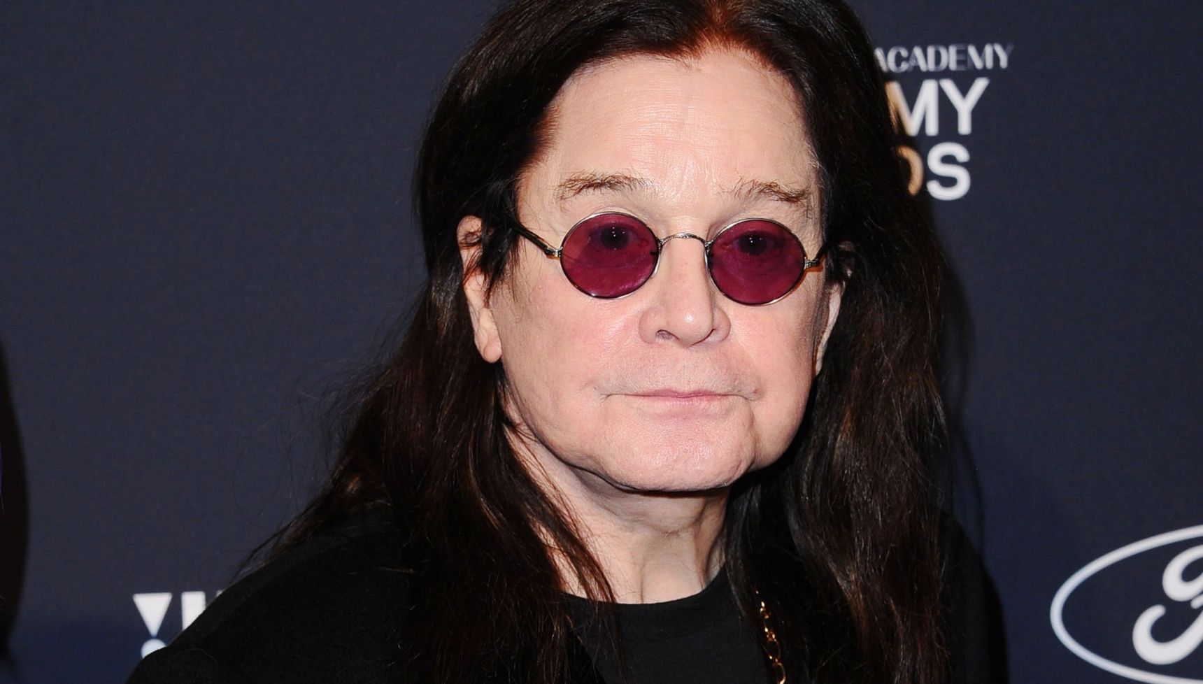 Ozzy Osbourne looking at the camera