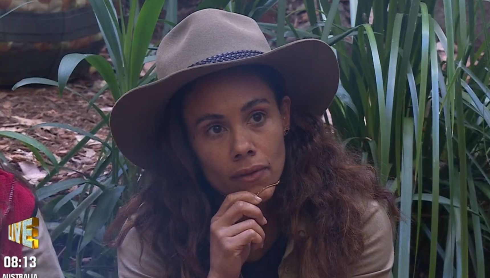 Alex Scott clutching her necklace on I'm A Celebrity 