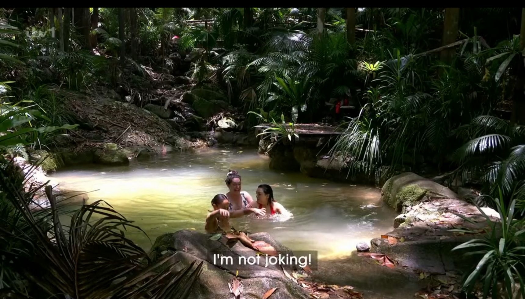 Kelly Brook swimming in the creek