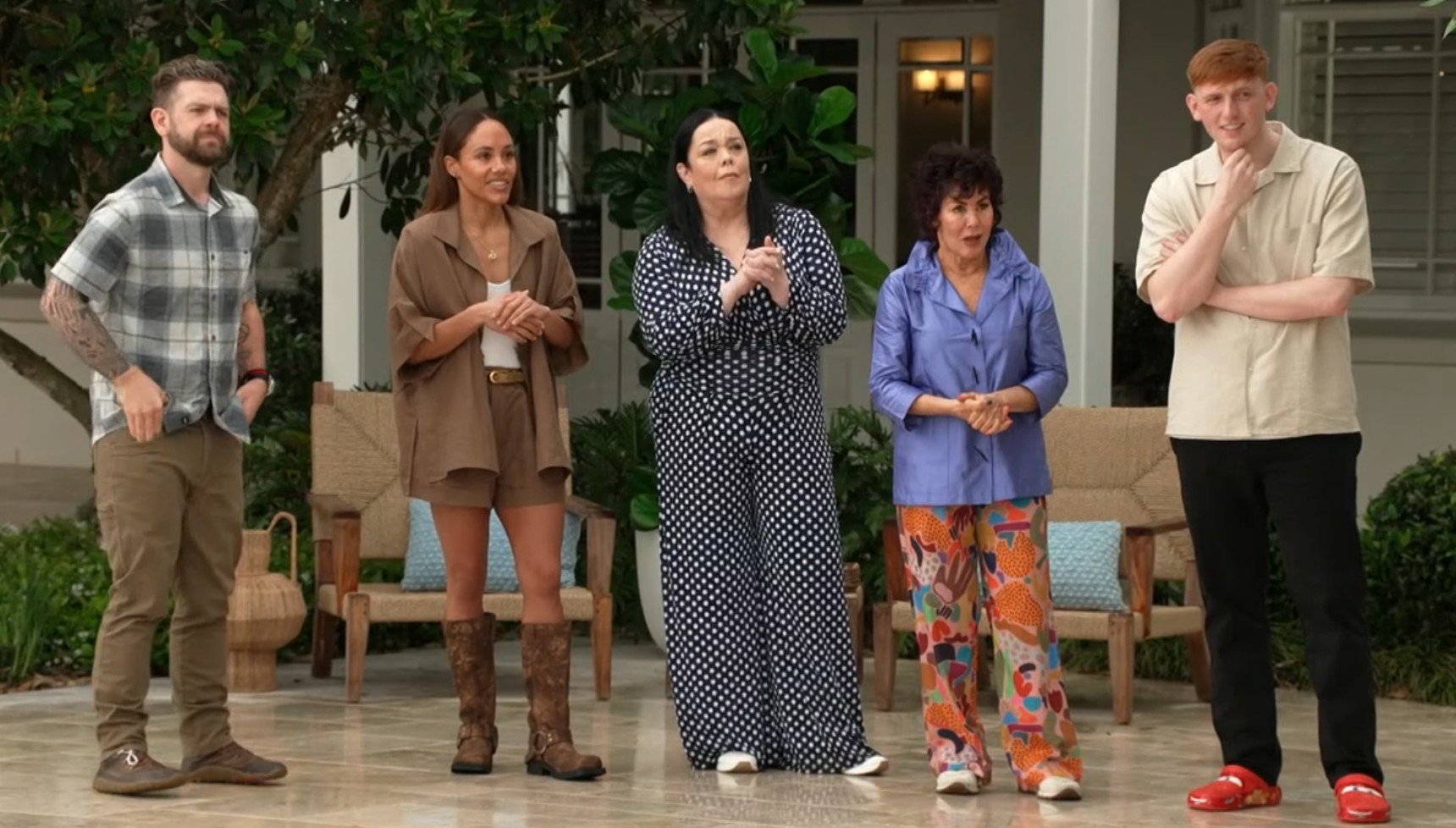 Jack Osbourne, Alex Scott, Lisa Riley, Ruby Wax and Angry Ginge standing together in I'm A Celebrity