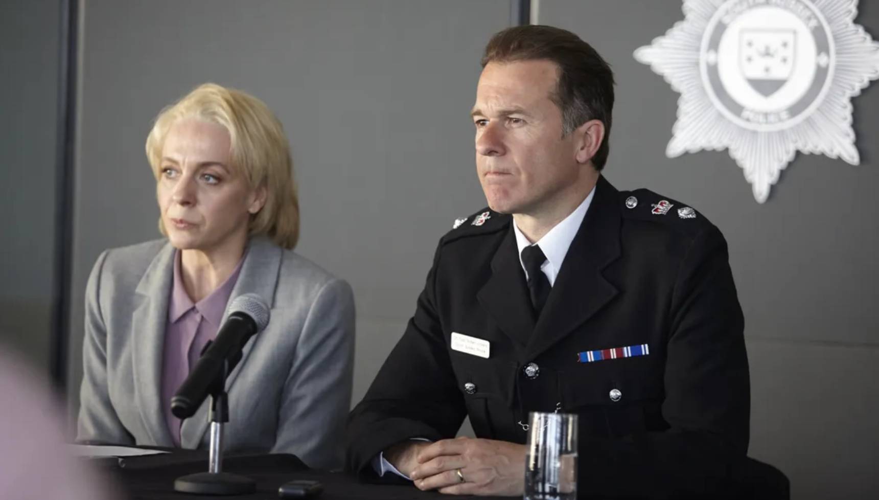 Jo with Chief Super Robert Vickers at a press conference in Cuffs