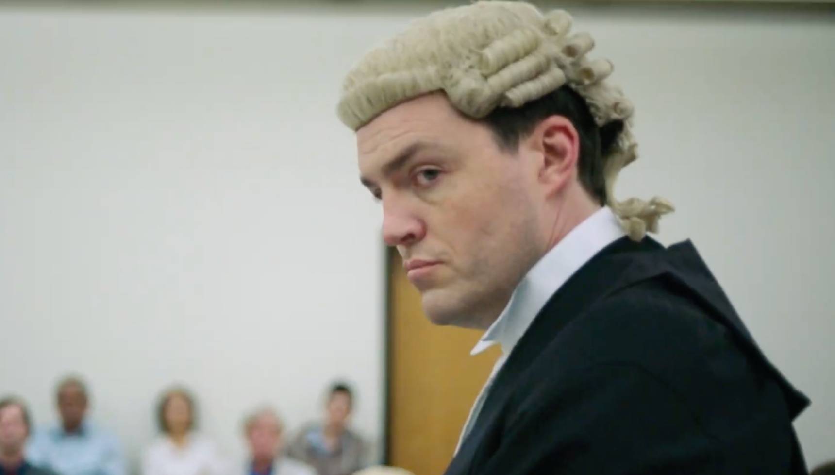 Tom Burke as prosecuting barrister William Ramsden in Responsible Child 