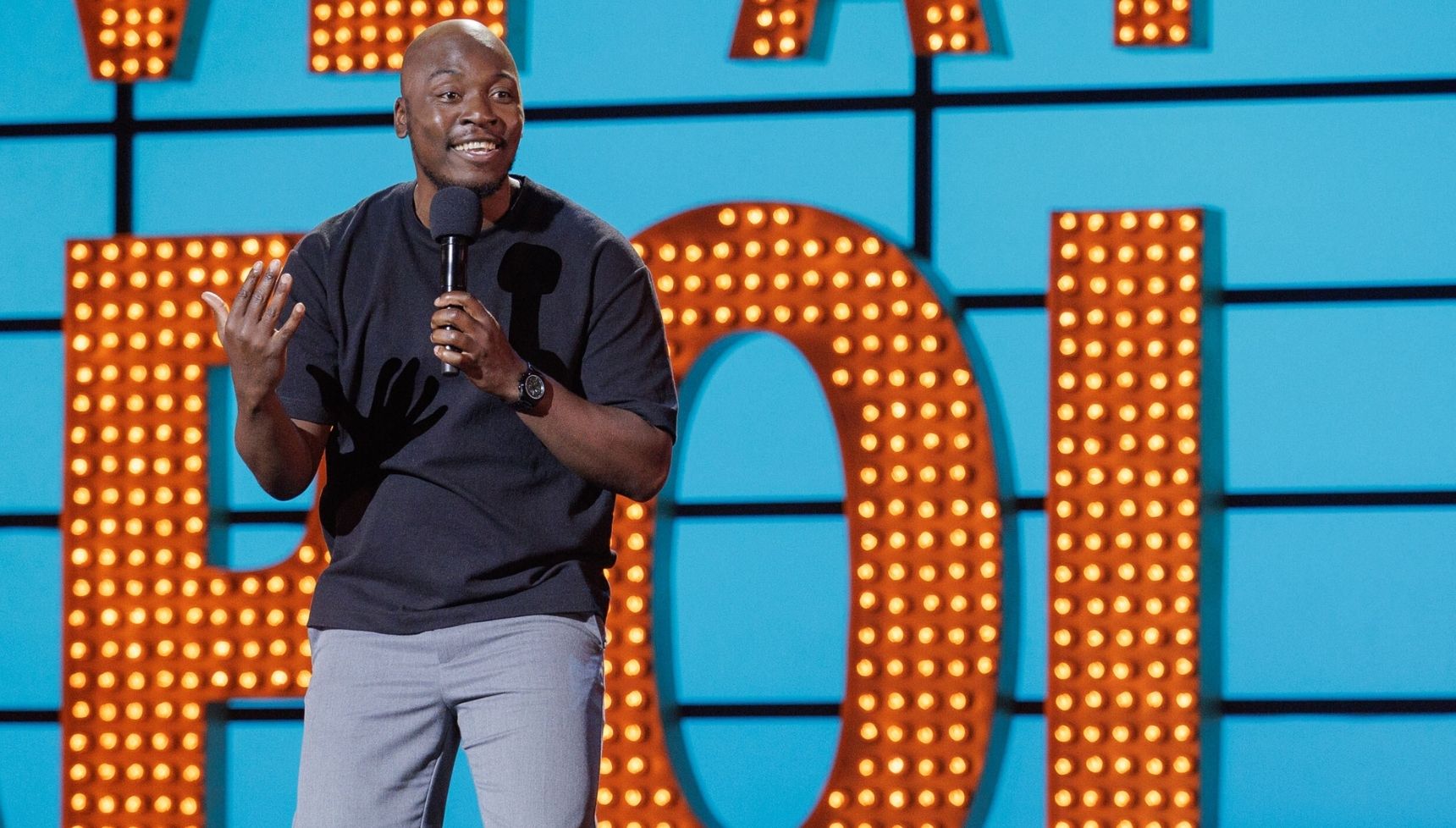 Eddie Kadi on stage at Live at the Apollo