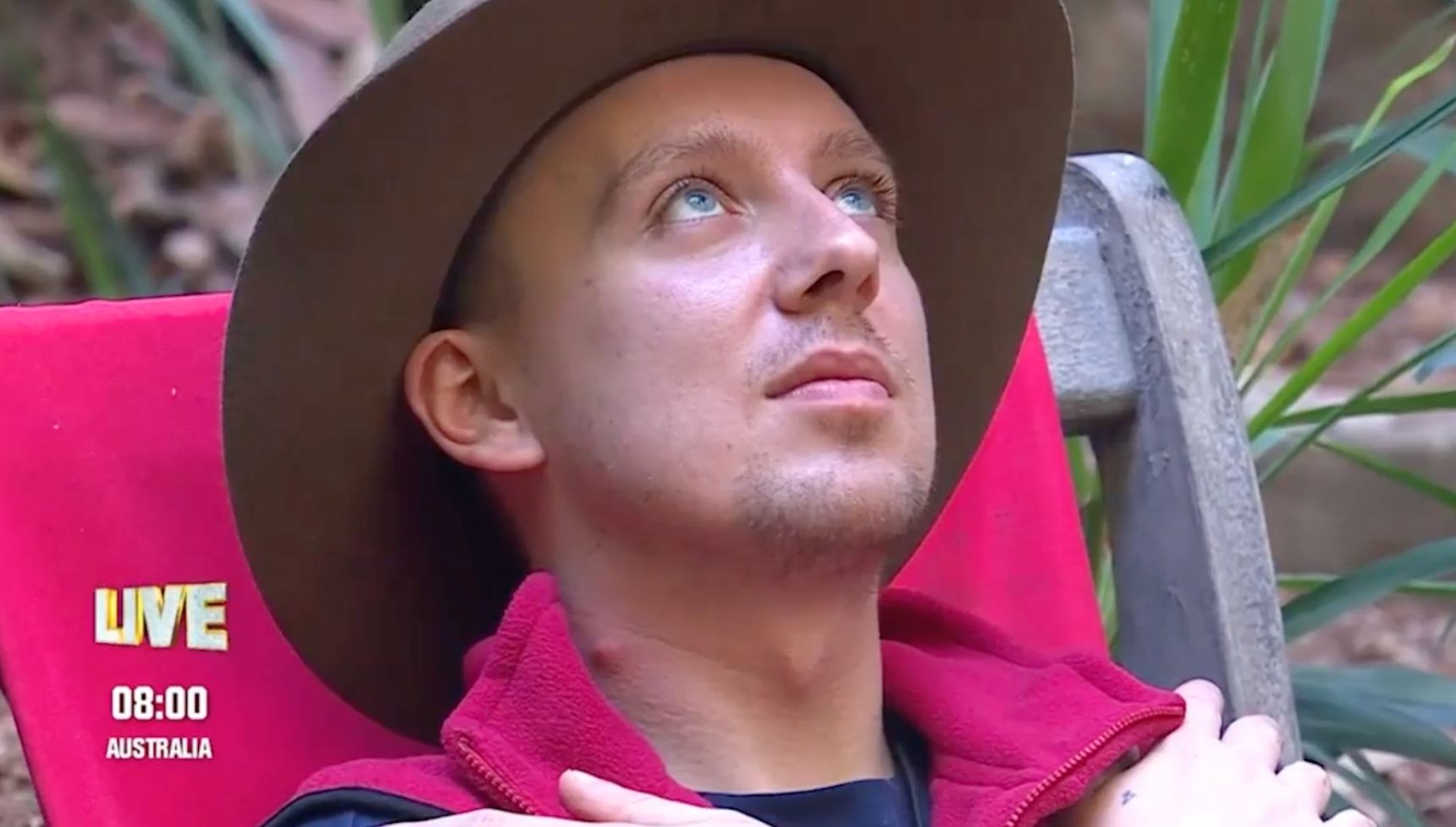 Aitch with spot on his neck 